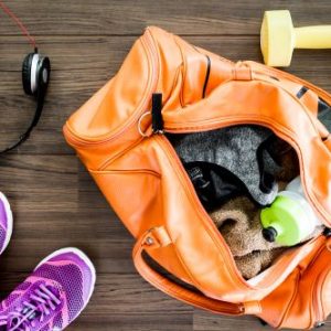 clean your gym bag with disinfectant spray
